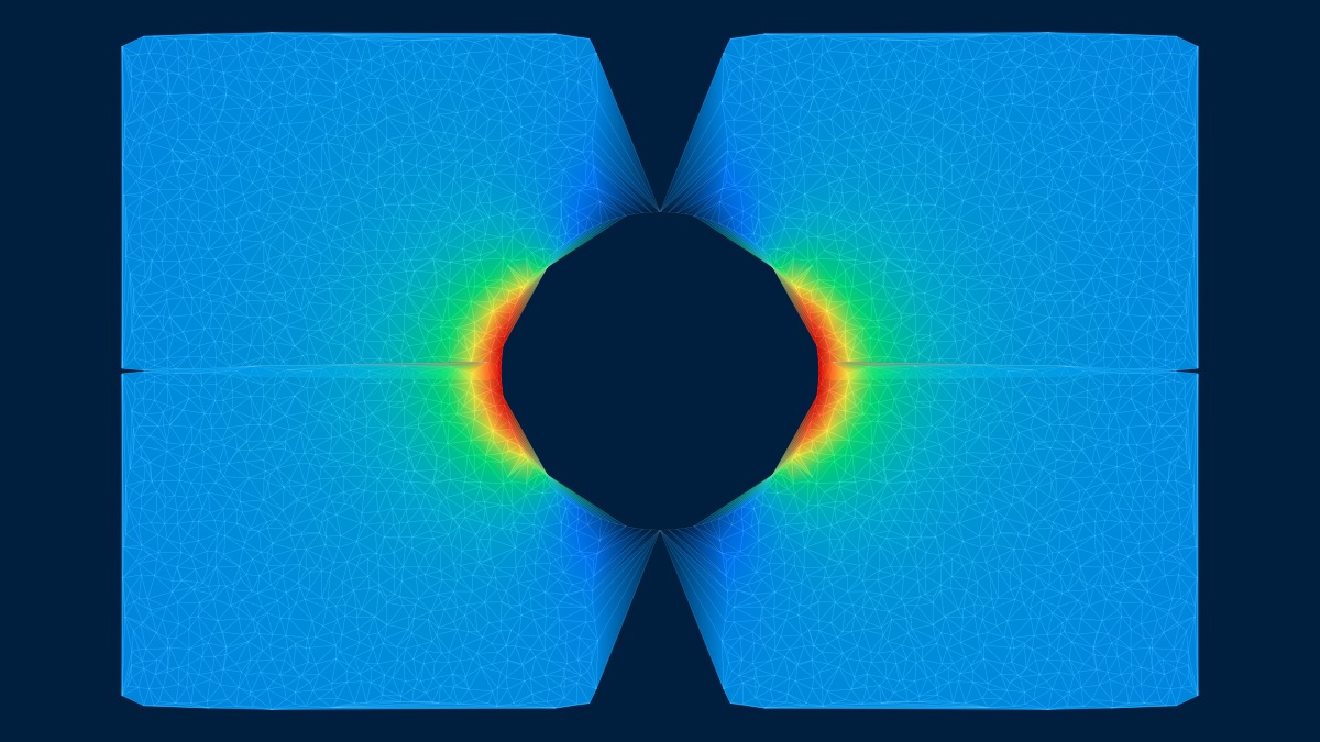 FEM mesh with von Mises stress contour on a plate with circular hole showing stress concentration